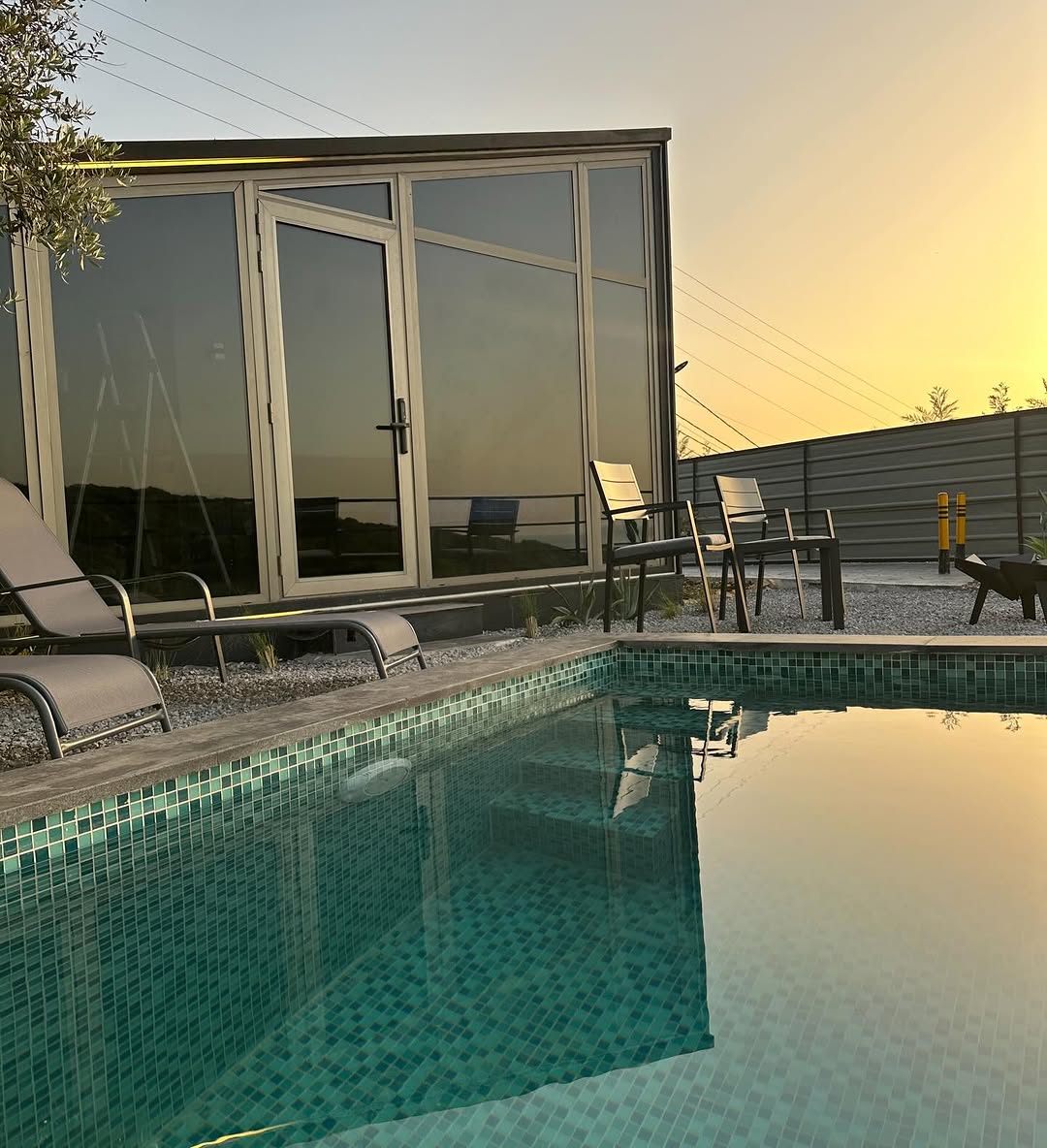 EmberHaus II infinity pool at sunset